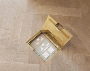 socket box in wood floor