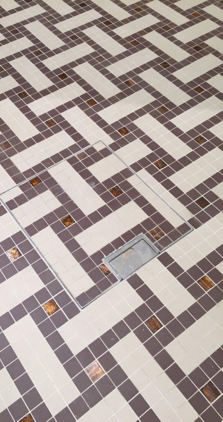discreet floor box tailored for mosaic-style flooring