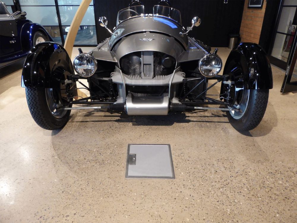 grey floor box in car showroom