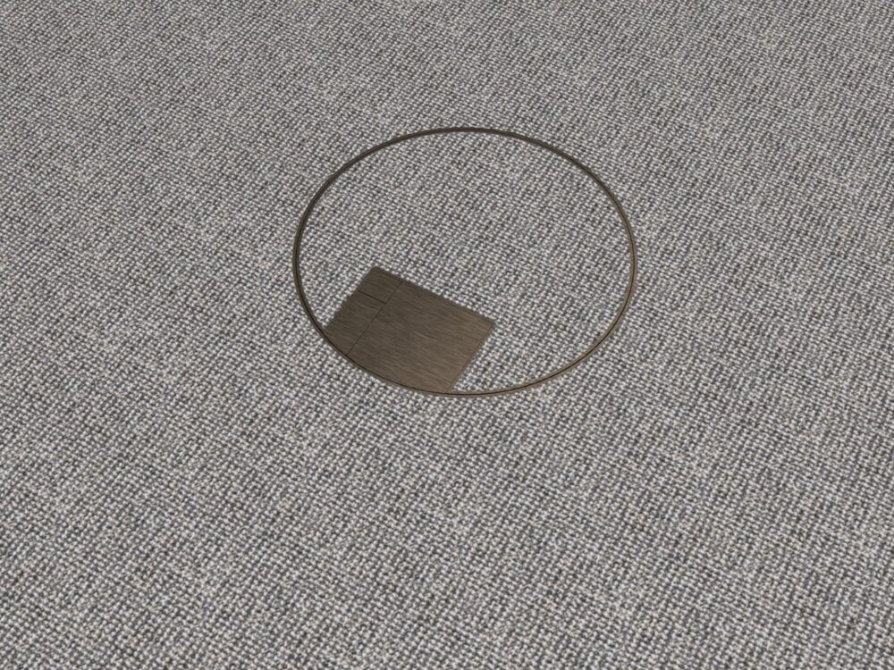 Close-up of round carpet floor box bronze